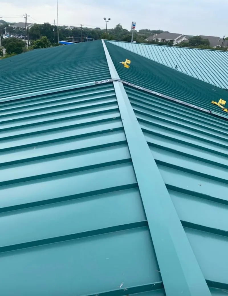 Green commercial metal roof ridge and valley for Metal Roof Repair in Milton-Freewater
